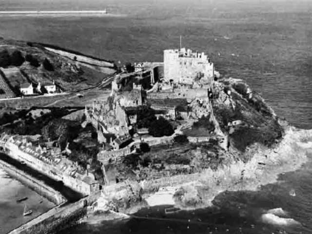 Mont Orgueil castle with St Catherines breakwater in background